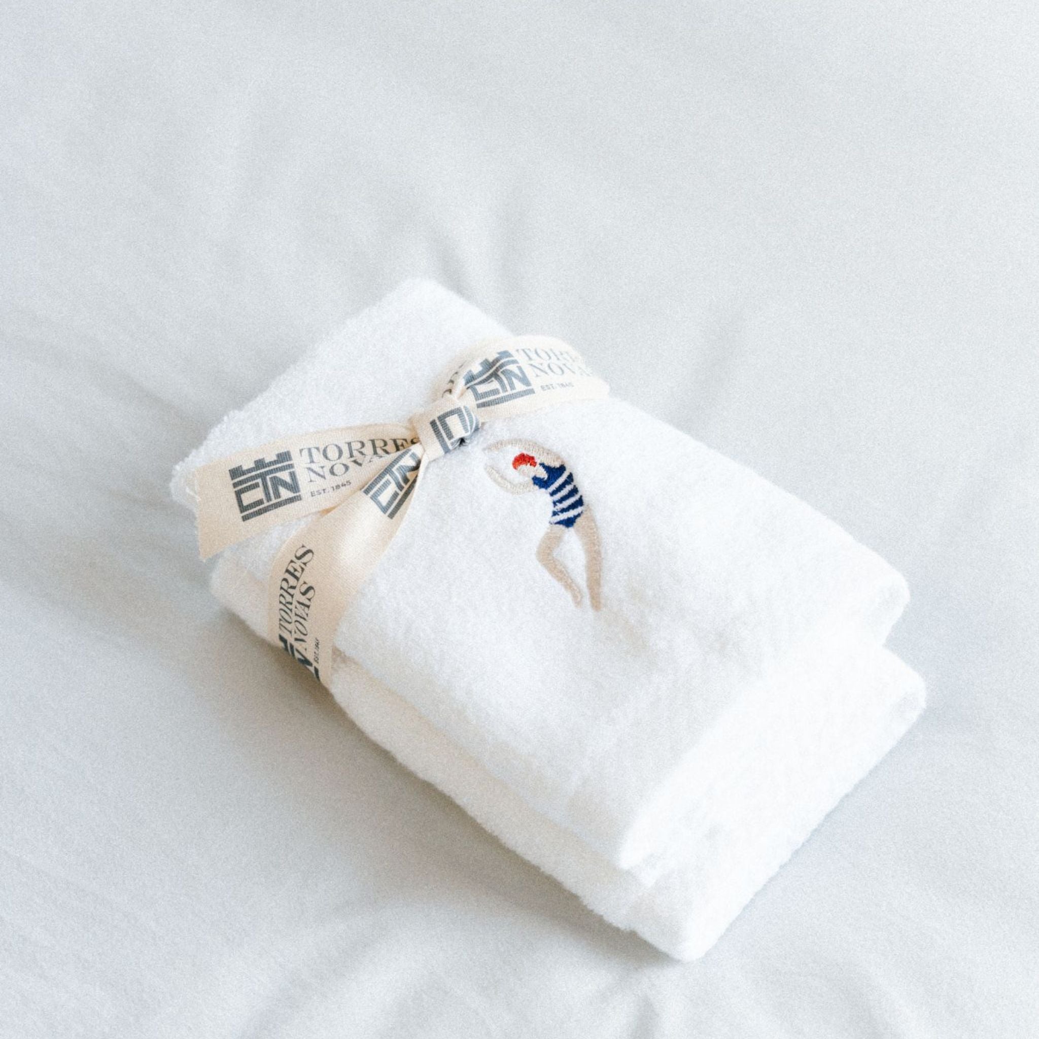 torres-novas-bath-embroidery-retro-guest-towel-swimmers-lifestyle-2.jpg