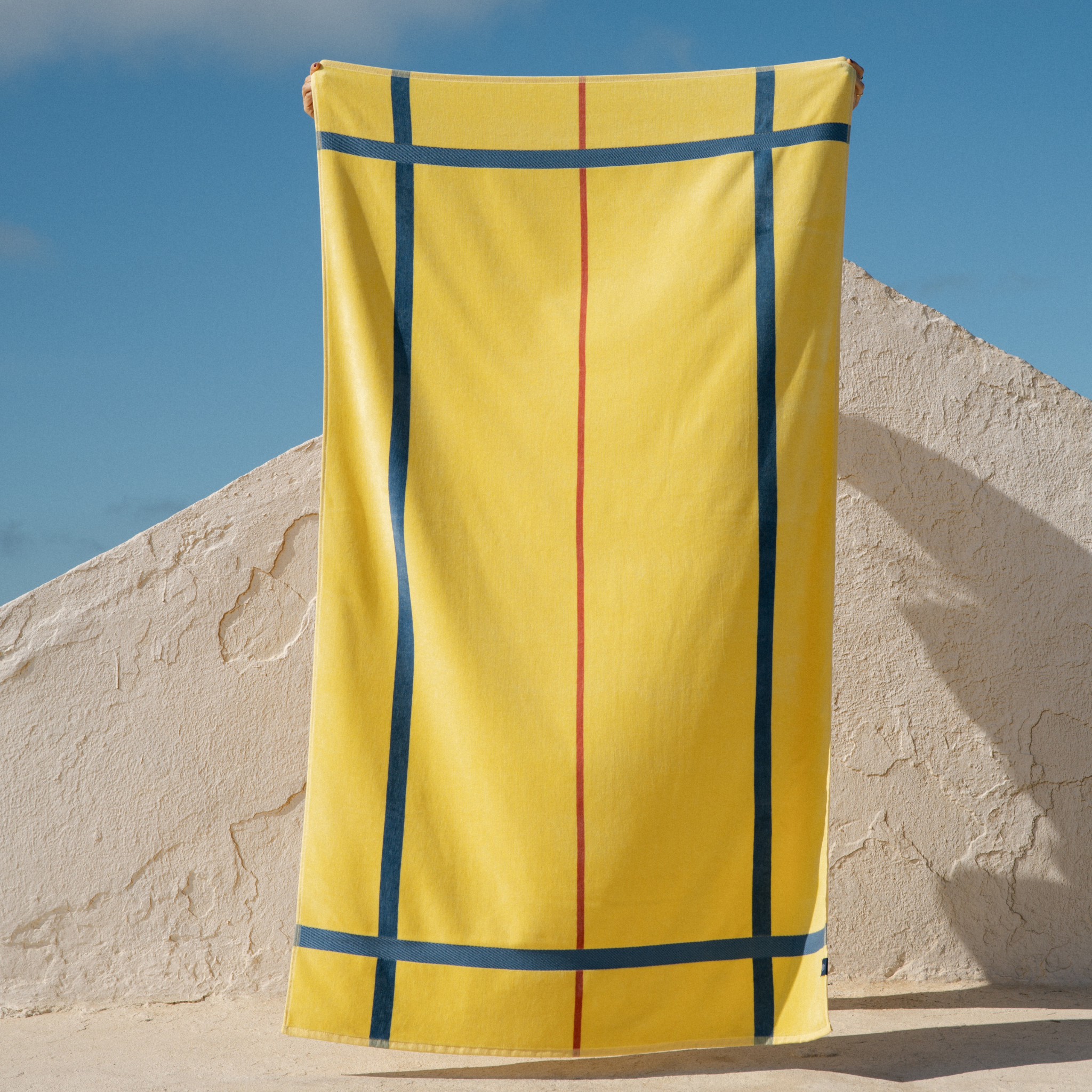 torres-novas-beach-alvor-plain-with-stripes-towel-yellow-lifestyle-1.png