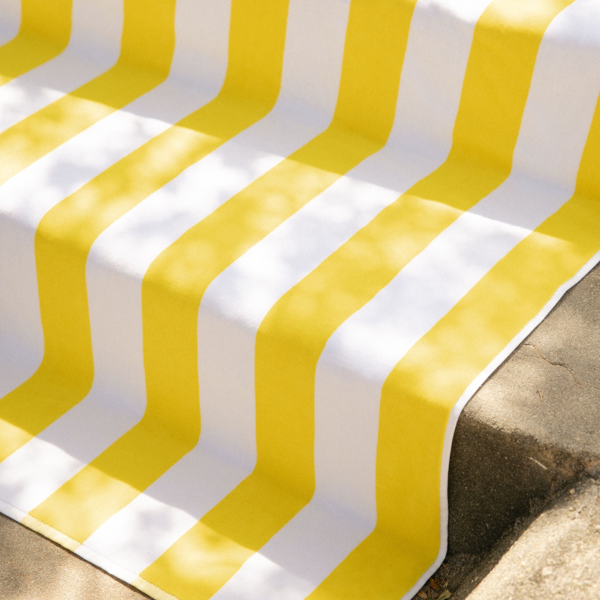 torres-novas-beach-gibalta-vertical-stripes-towel-yellow-lifestyle-4.jpg