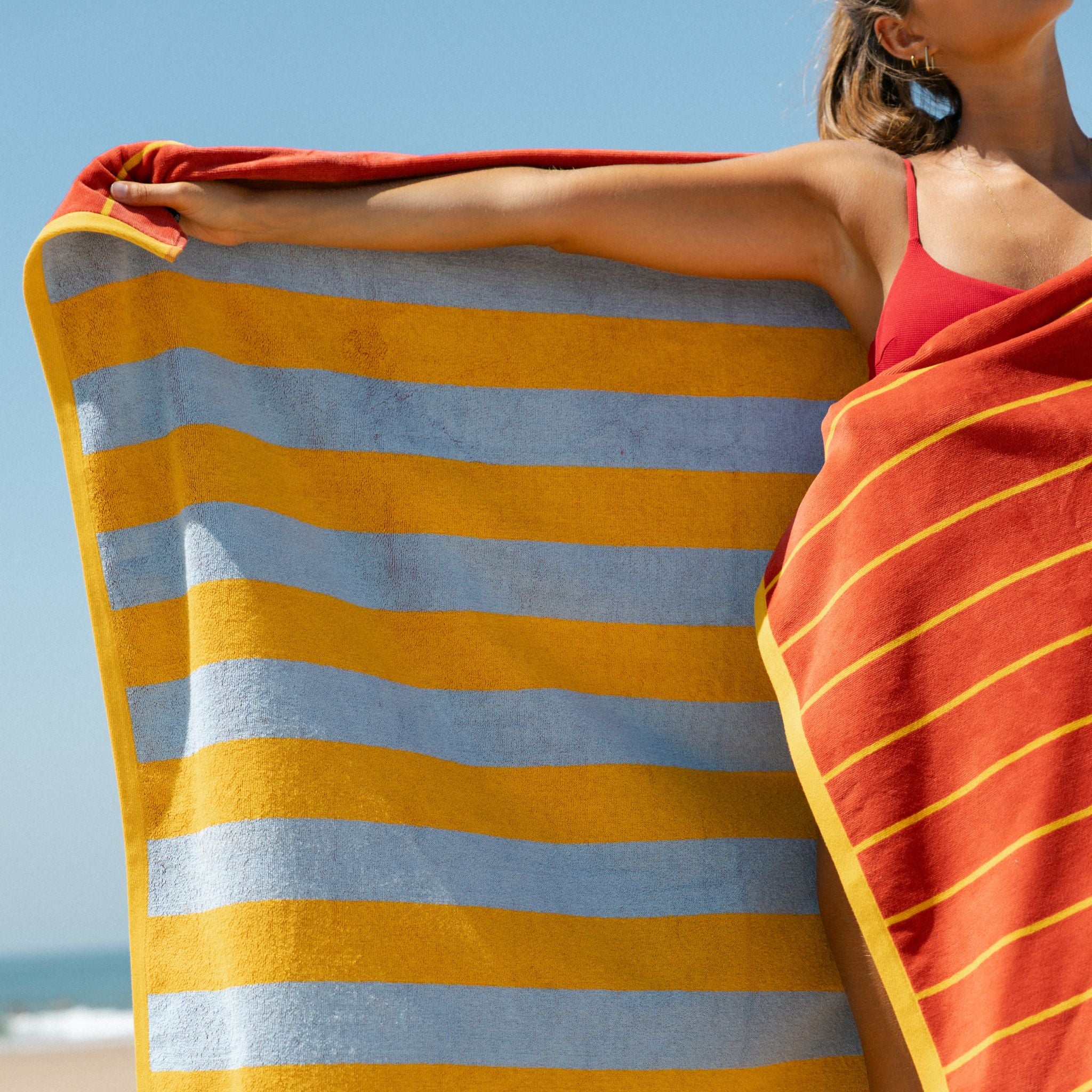 torres-novas-beach-pena-vertical-stripes-towel-yellow-lifestyle-9.jpg