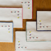 Nazaré ecru cotton table linen with embroidered flowers