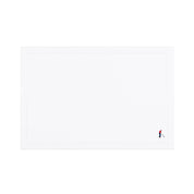 Nazaré white cotton table linen with embroidered retro sports motifs