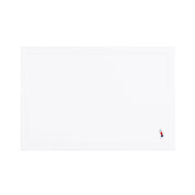 Nazaré white cotton table linen with embroidered retro sports motifs