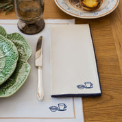 Nazaré white cotton table linen with embroidered Portugal-inspired motifs