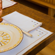 Nazaré white cotton table linen with embroidered flowers