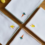 Nazaré white cotton table linen with embroidered Easter motifs