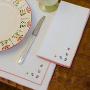 Nazaré white cotton table linen with embroidered flowers